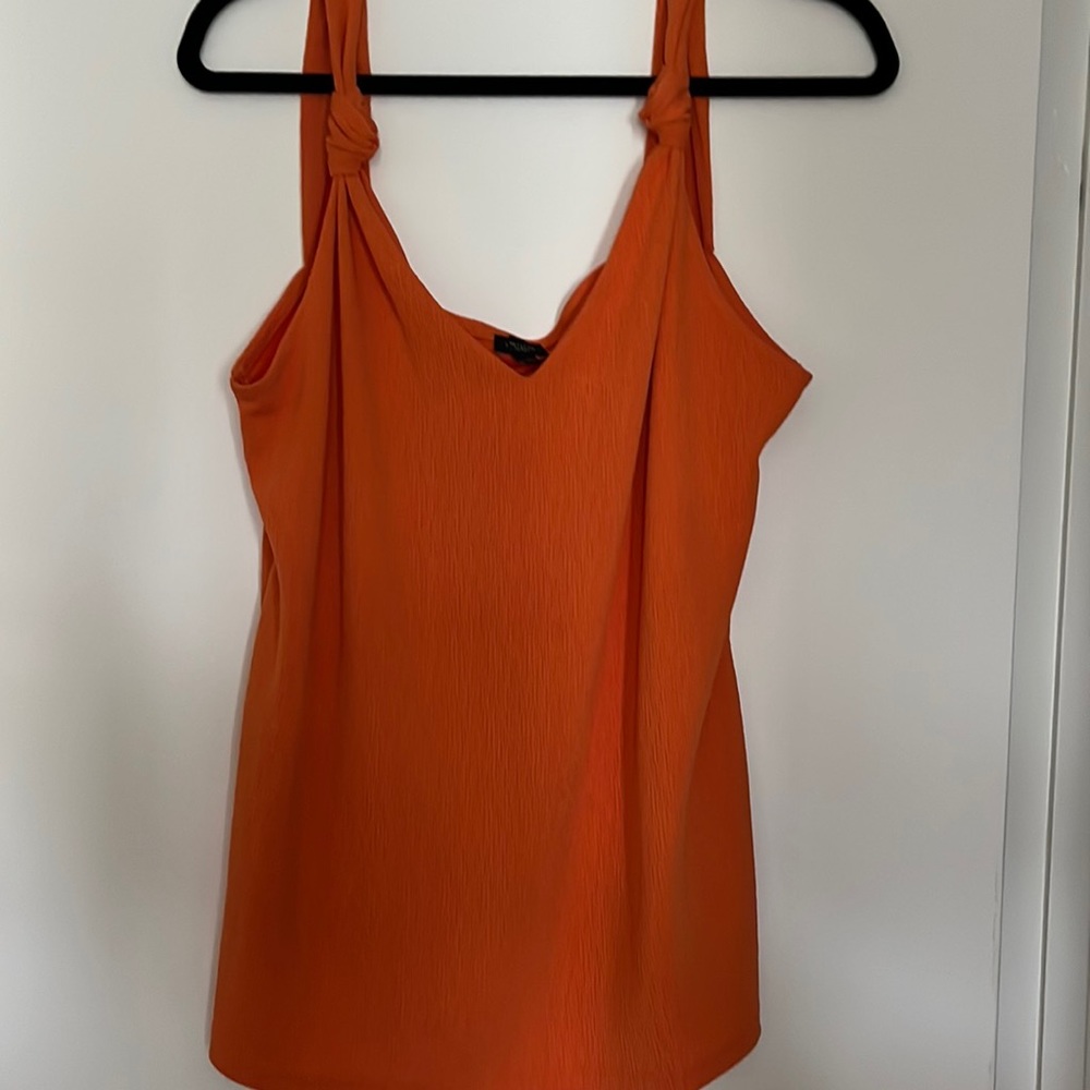 Ann Taylor ladies dress blouse with no sleeves and knot detailing
